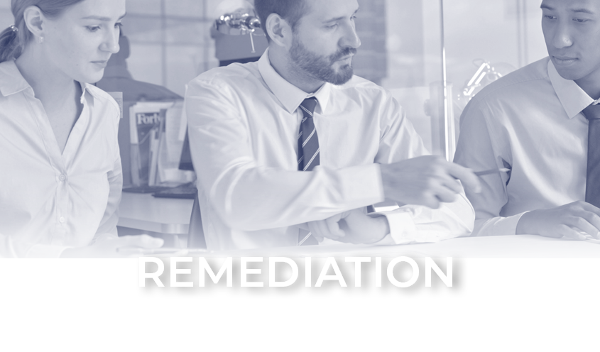 Two men and a woman at a table having a conversation about Remediation