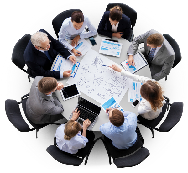 Eight people sitting at a round table discussing a project