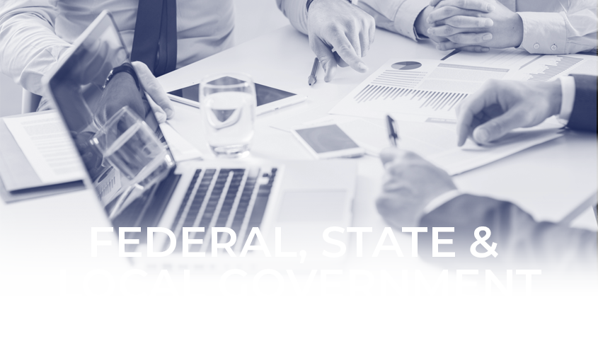 Ransomware Prevention for Federal, State, and Local Government Image with laptop and graphs